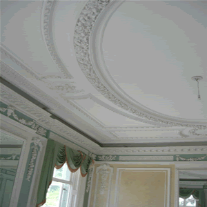 Close up of ornate mouldings on ceiling